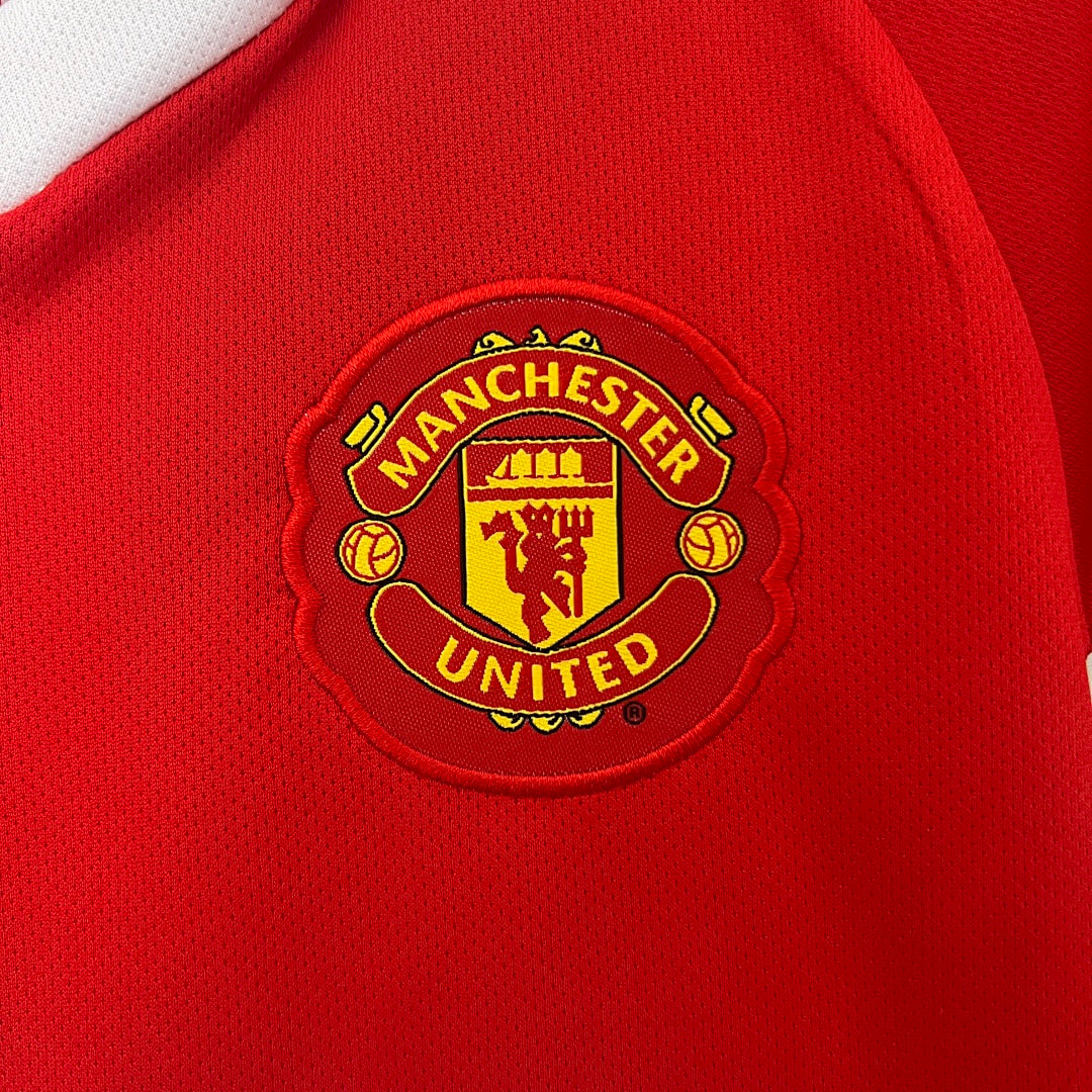 Kit Manchester United Principal Criança 10/11