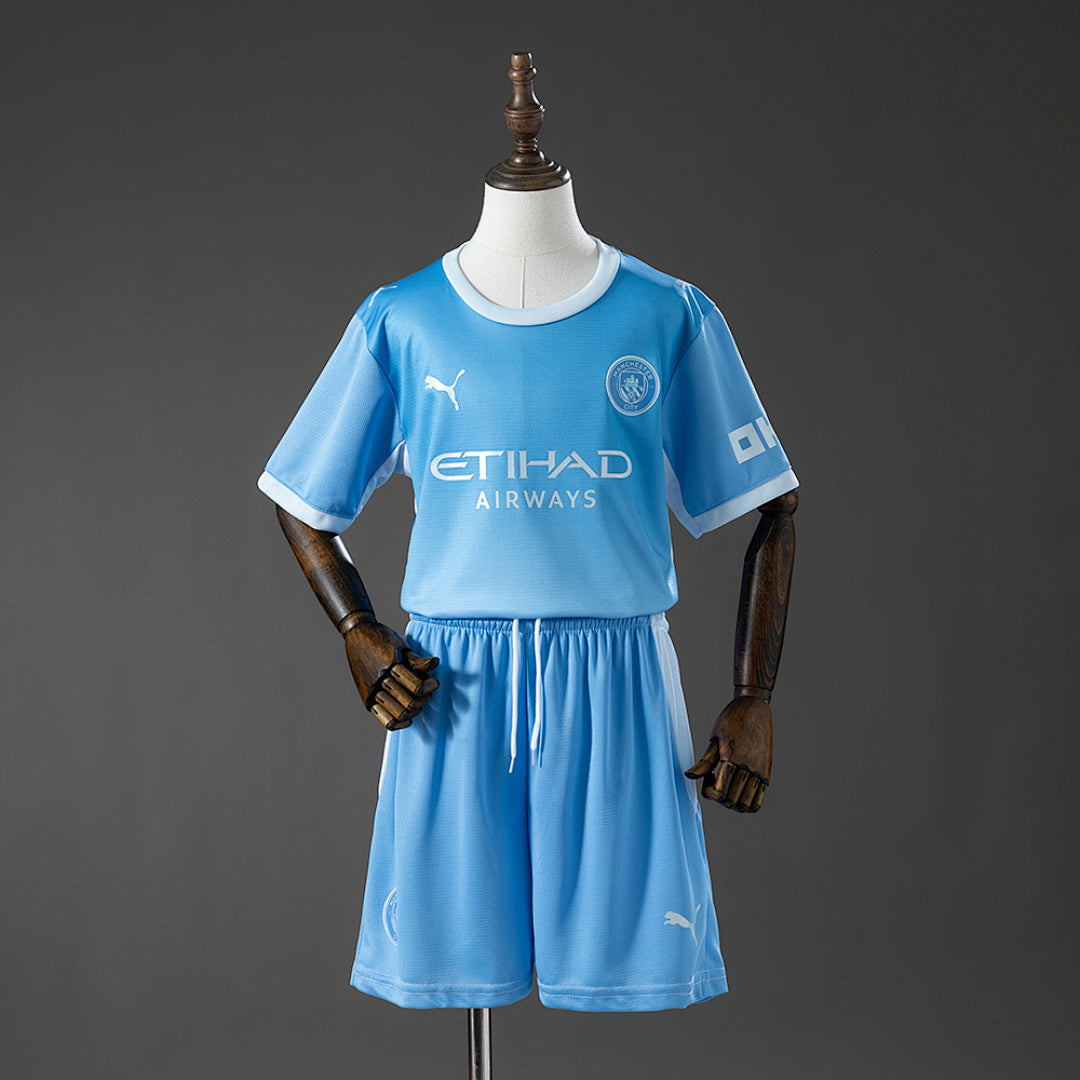 Kit Manchester City Principal Criança 26/27