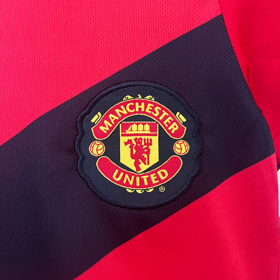 Kit Manchester United Principal Criança 09/10