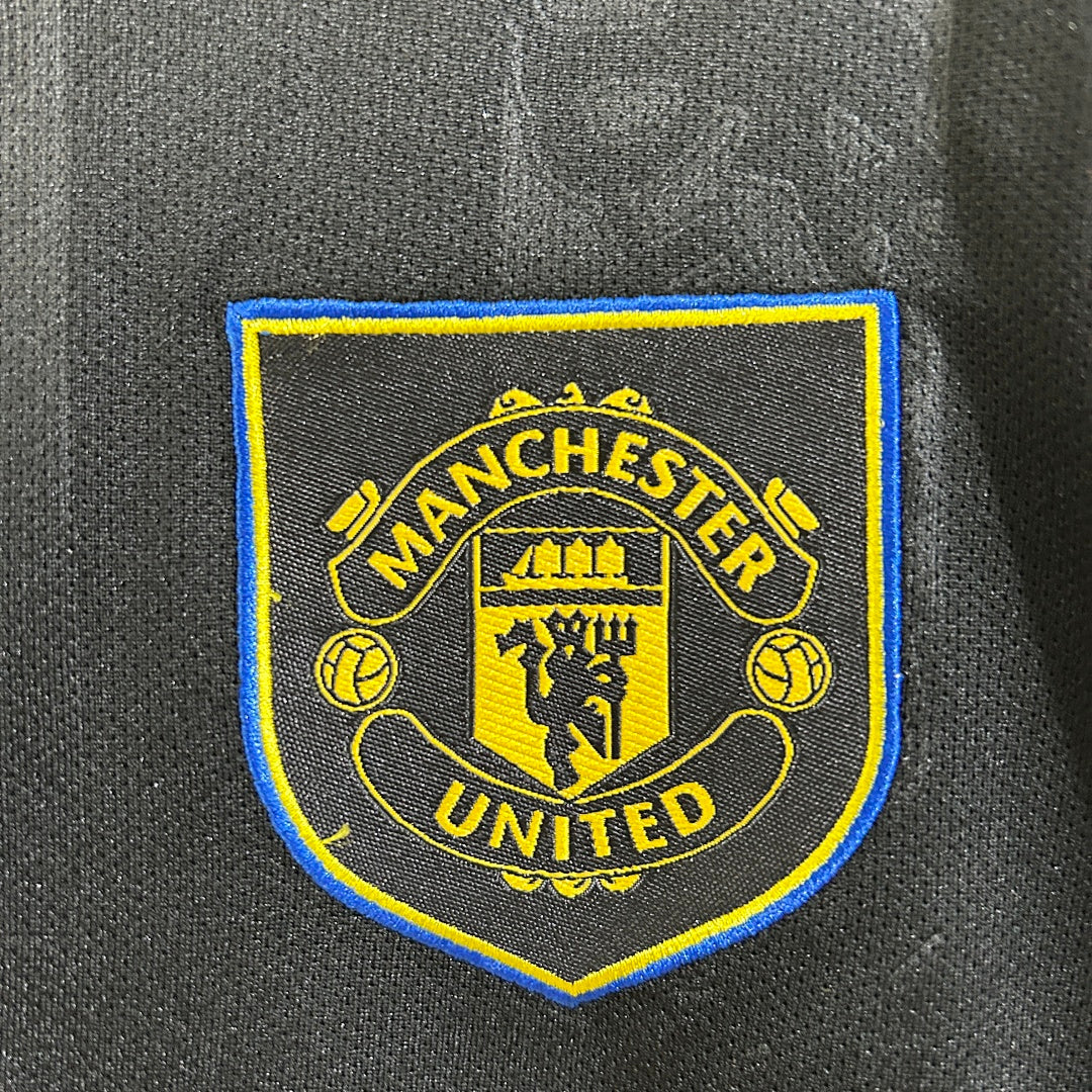 Kit Manchester United Terceira Criança 25/26
